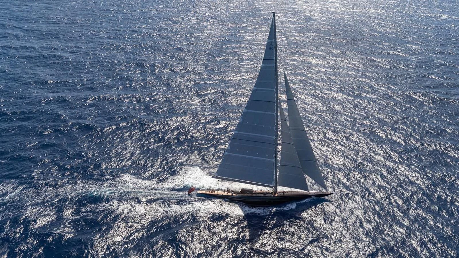 a boat sailing on the sea aboard RAINBOW Yacht for Sale