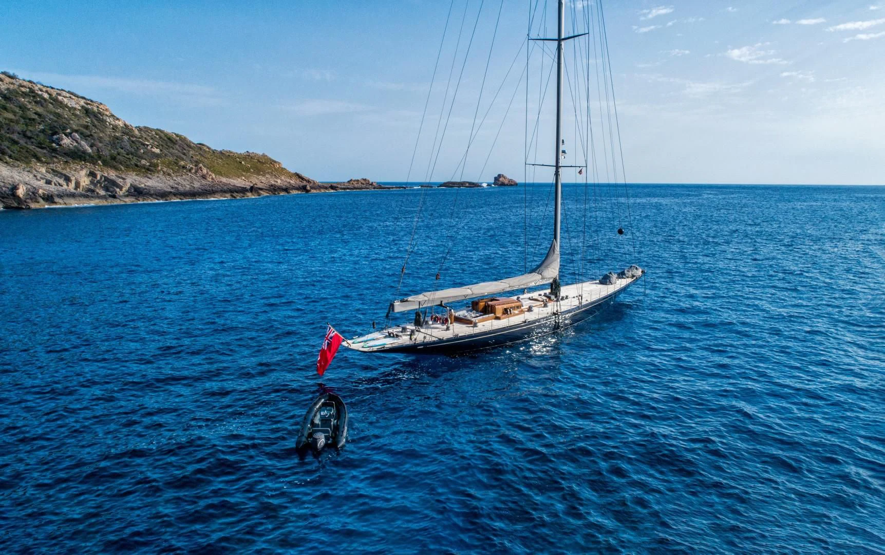 a boat sailing in the sea aboard RAINBOW Yacht for Sale