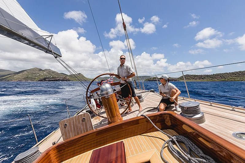 men on a boat aboard RAINBOW Yacht for Sale