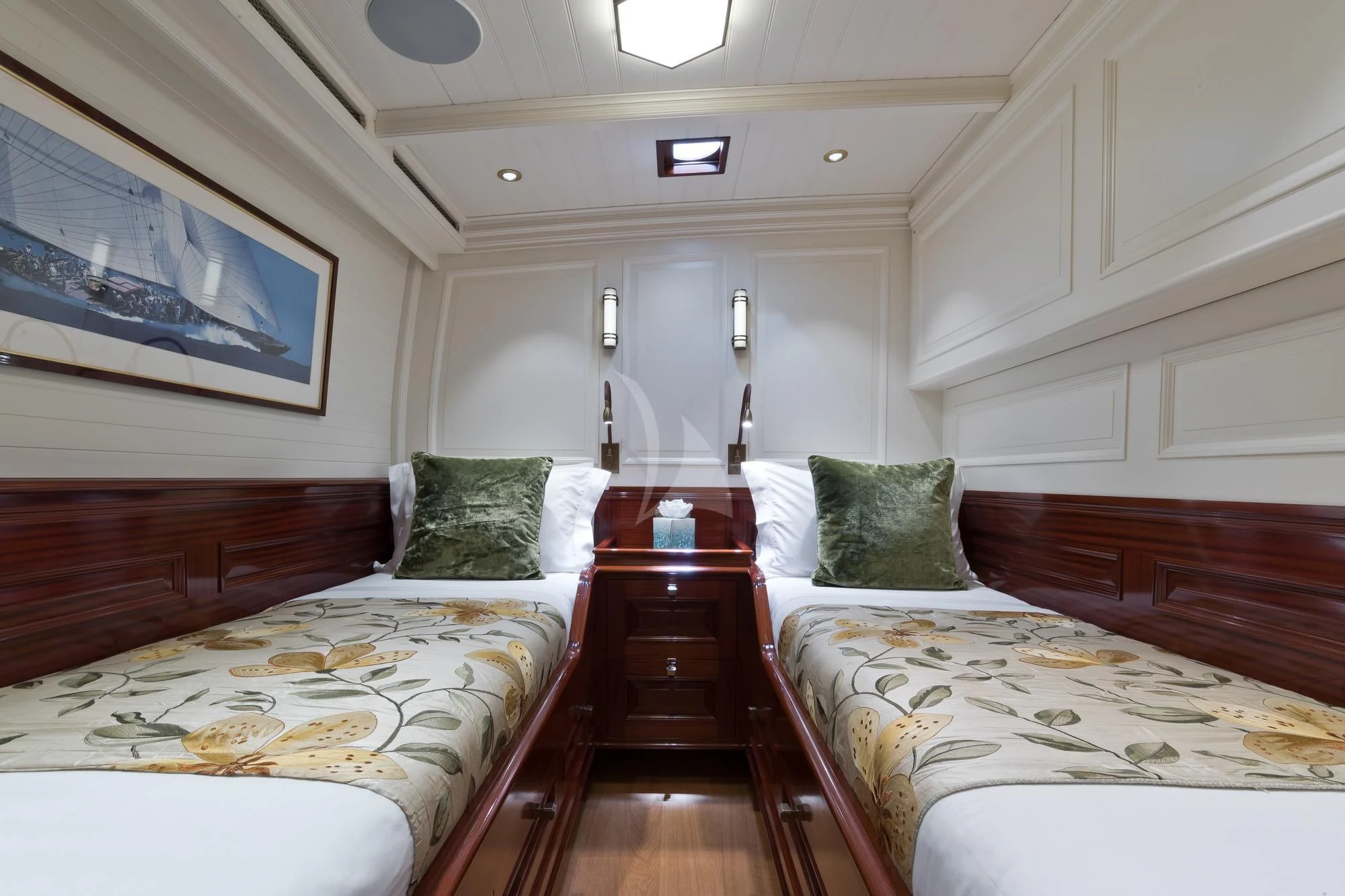 a room with two beds aboard RAINBOW Yacht for Sale