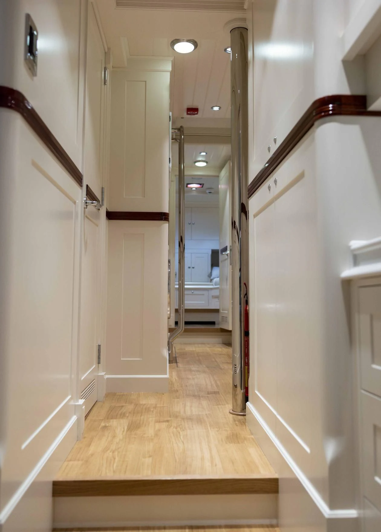 a hallway with doors aboard RAINBOW Yacht for Sale