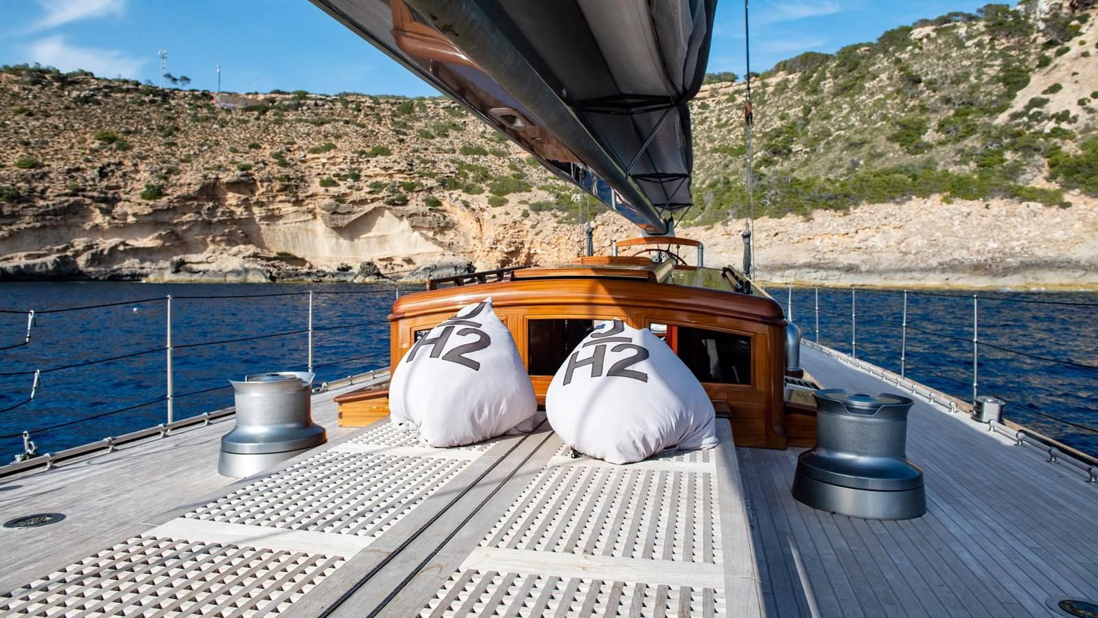a boat on a deck aboard RAINBOW Yacht for Sale