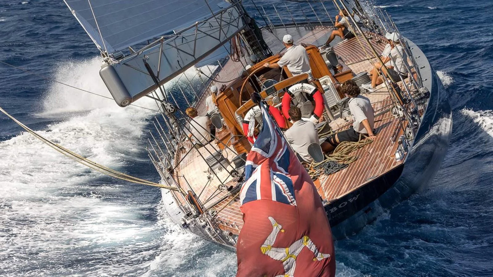 a group of people on a boat aboard RAINBOW Yacht for Sale