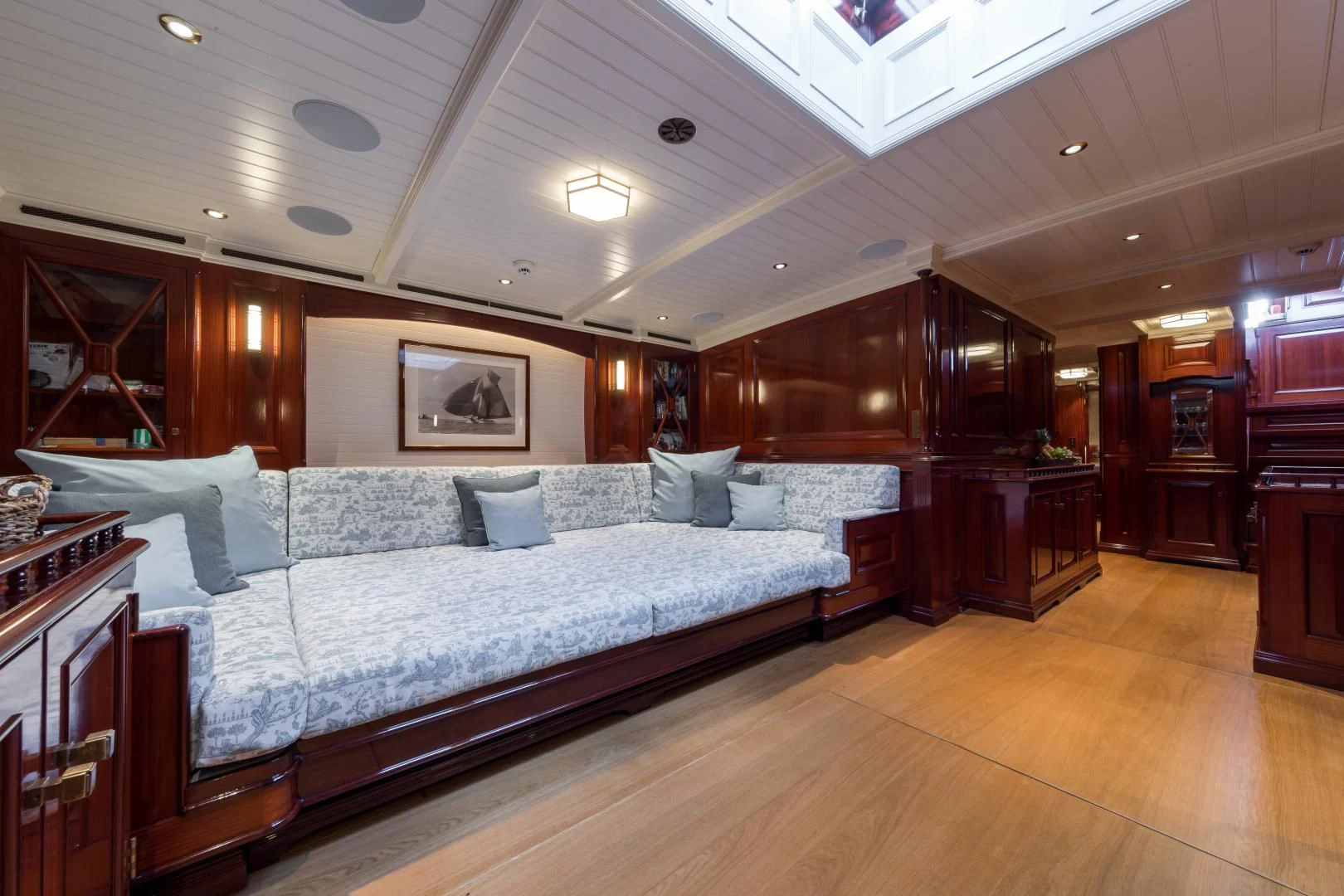 a large bed in a room aboard RAINBOW Yacht for Sale