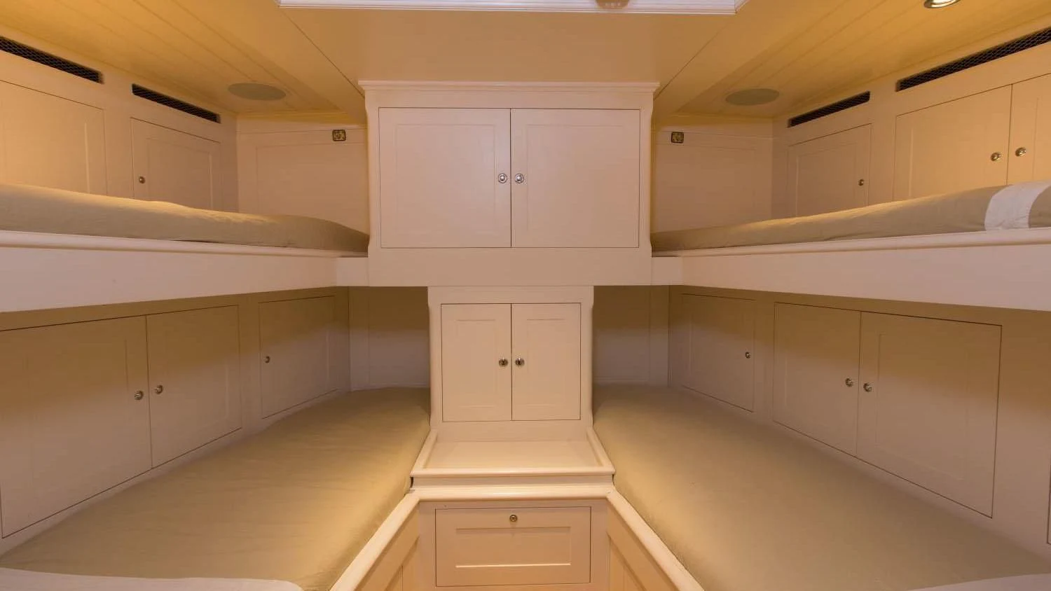 a room with white cabinets aboard RAINBOW Yacht for Sale