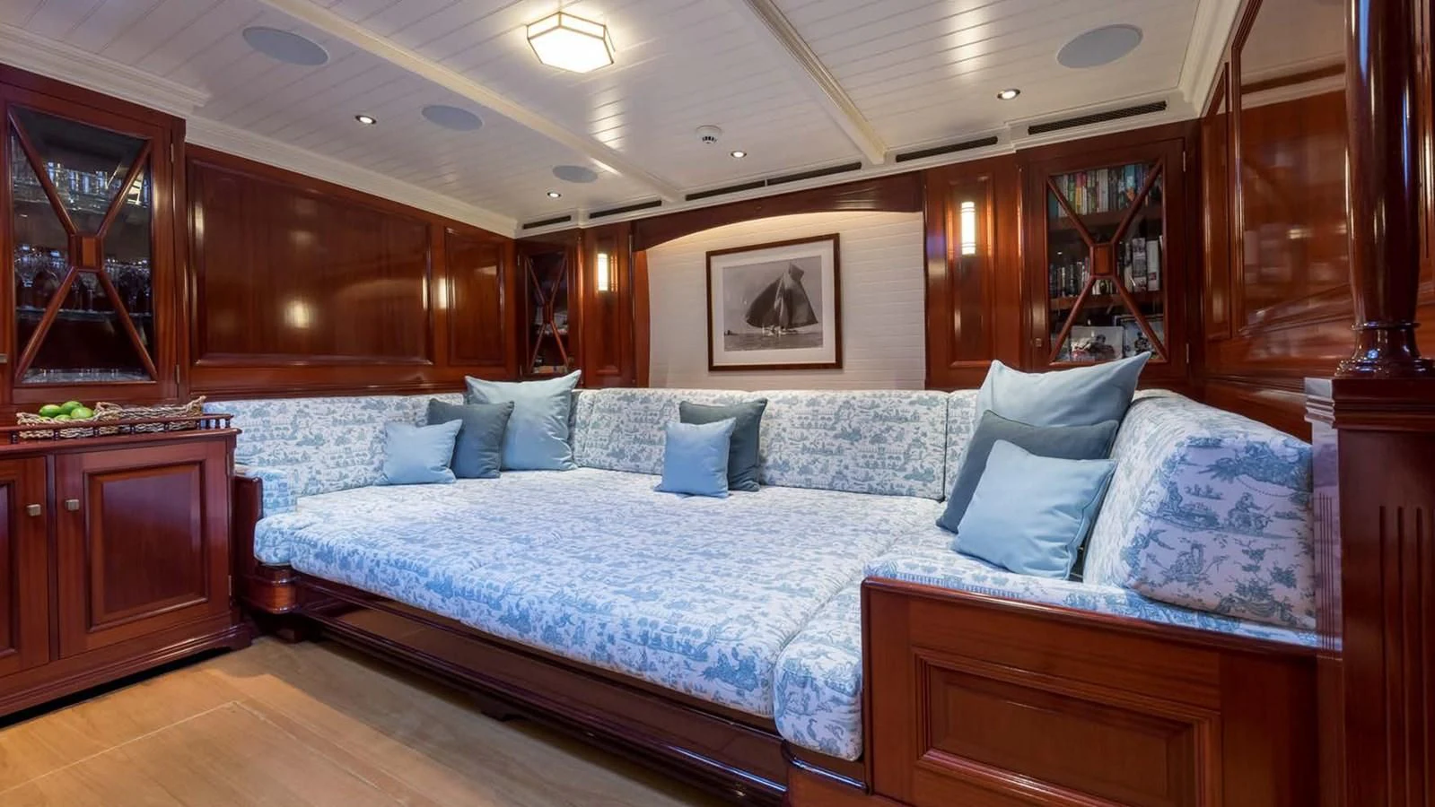 a large bed in a room aboard RAINBOW Yacht for Sale