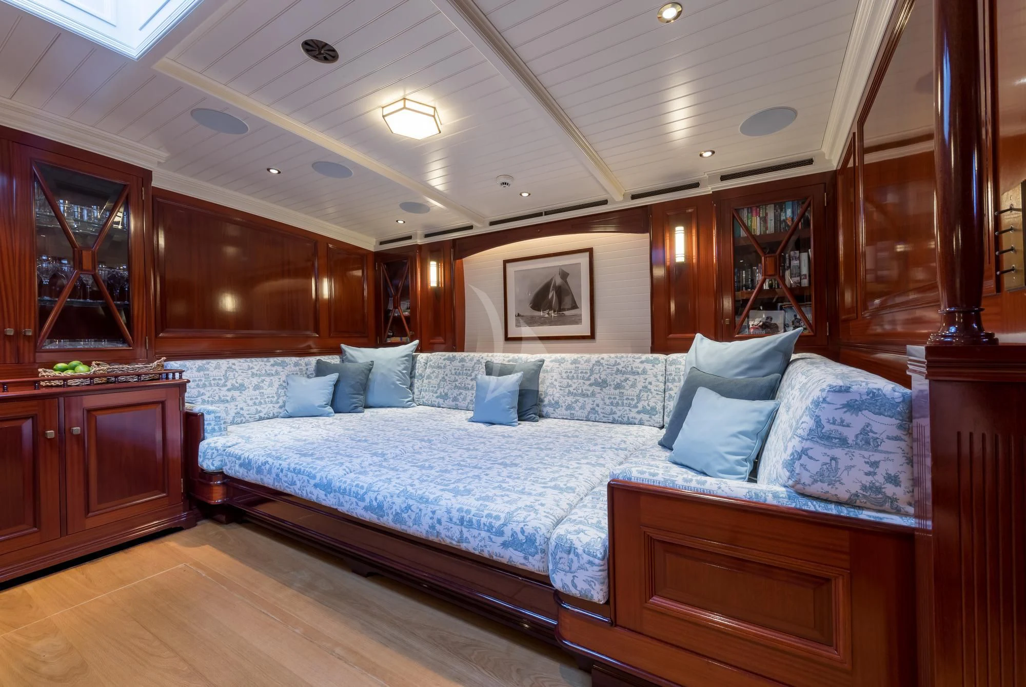 a large bed in a room aboard RAINBOW Yacht for Sale