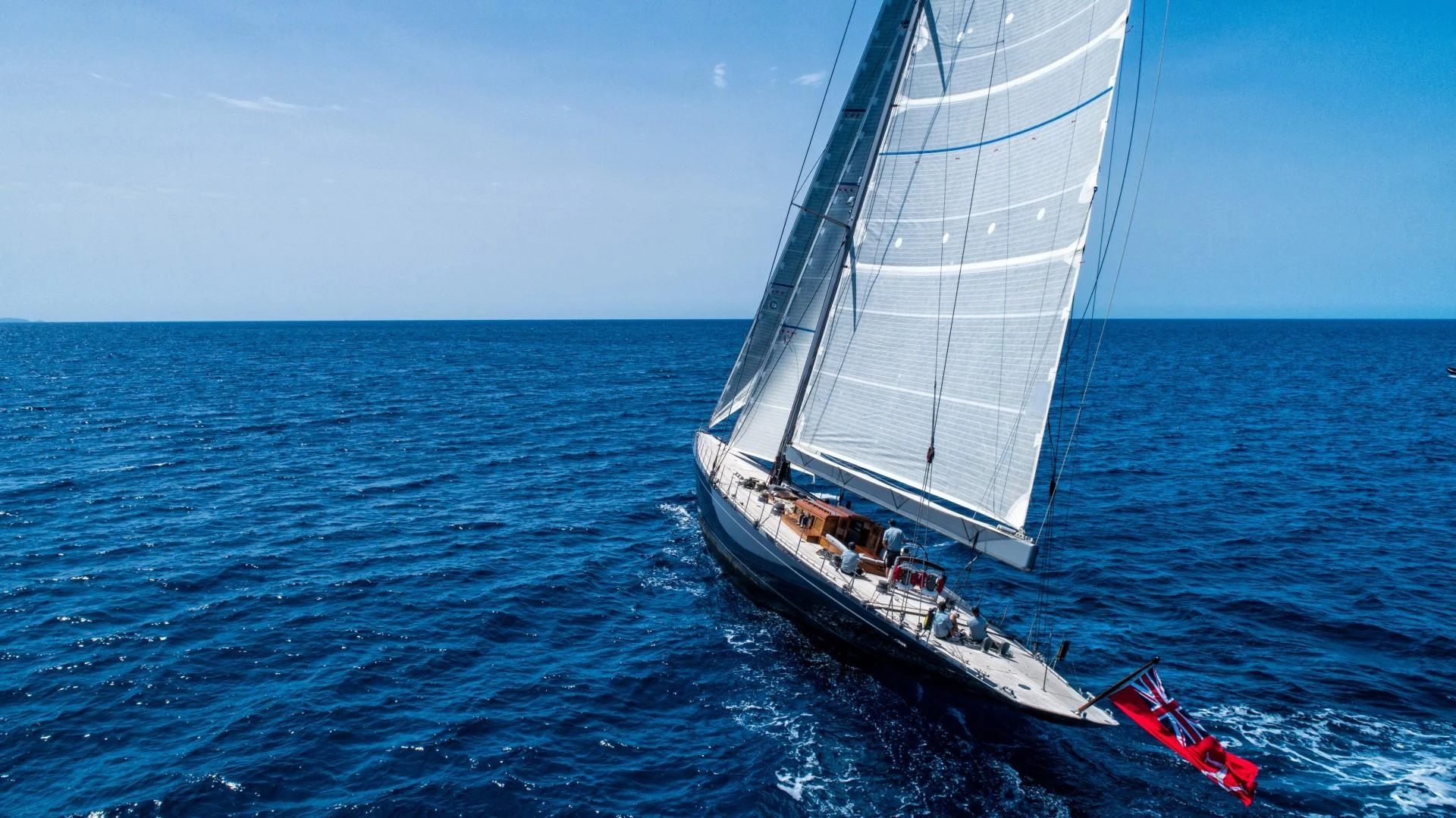 a boat sailing in the sea aboard RAINBOW Yacht for Sale