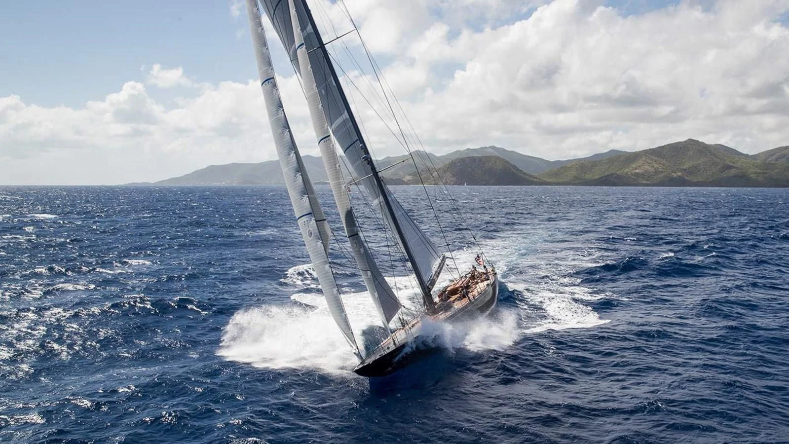 a person on a sailboat aboard RAINBOW Yacht for Sale