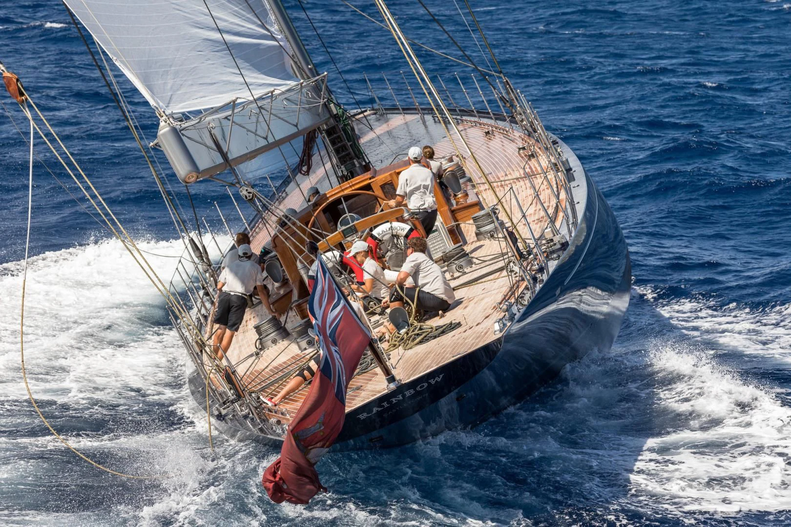 a group of people sailing on a boat aboard RAINBOW Yacht for Sale