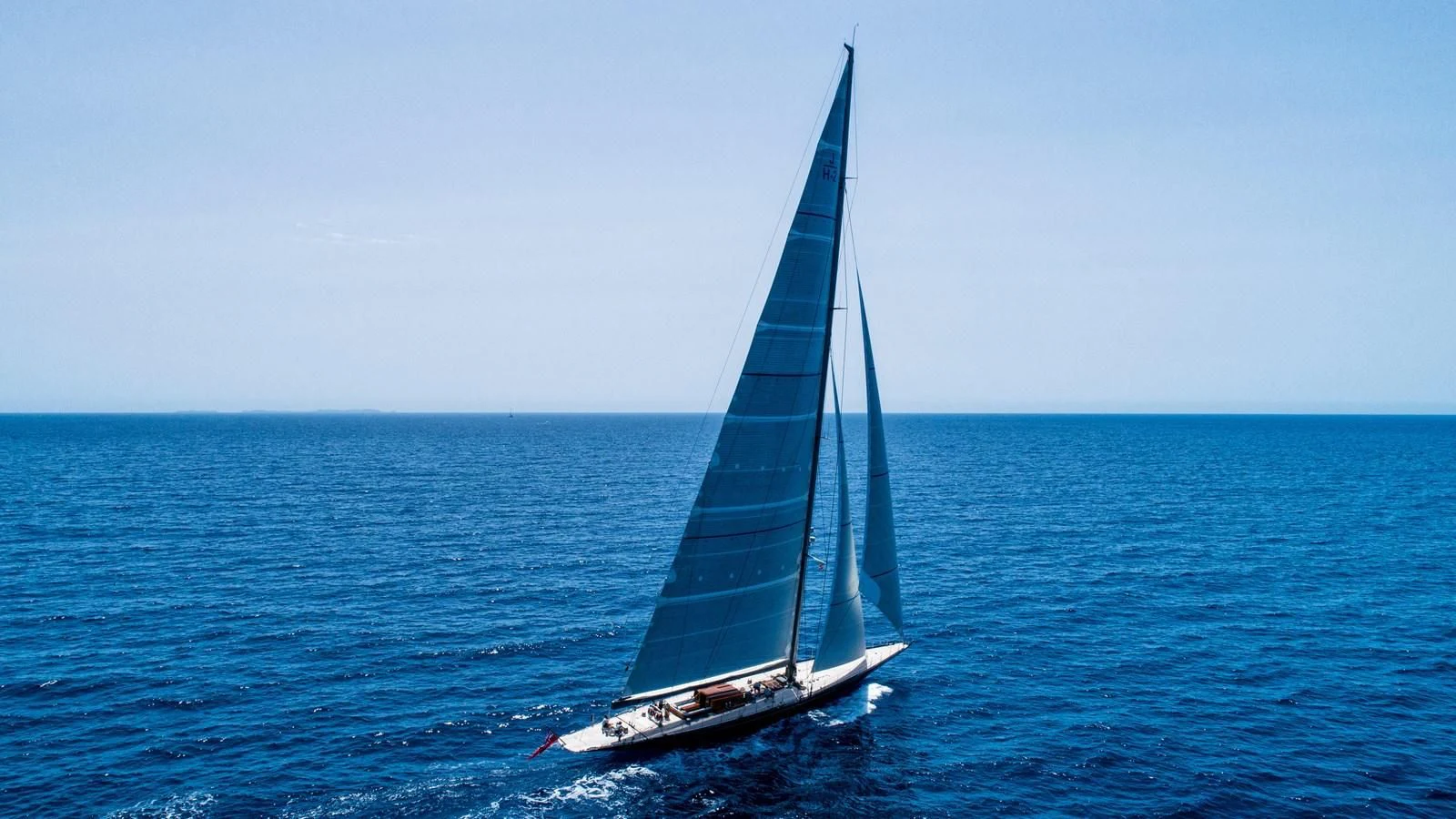 a sailboat in the water aboard RAINBOW Yacht for Sale
