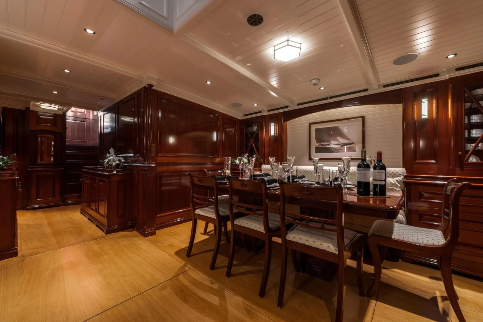 a bar with a table and chairs aboard RAINBOW Yacht for Sale