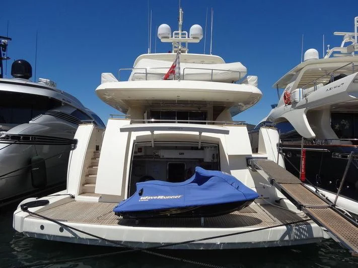 a boat docked at a pier aboard MAMMA MIA Yacht for Sale