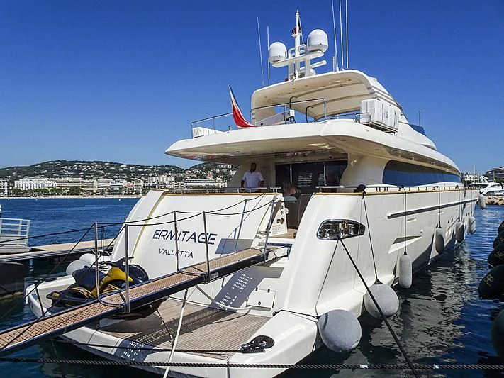a boat docked at a pier aboard MAMMA MIA Yacht for Sale