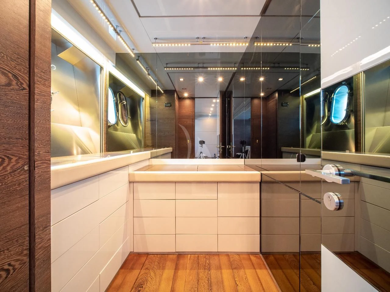 a bathroom with a large mirror aboard MAMMA MIA Yacht for Sale