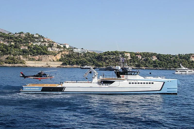 a boat with a person in it aboard POWER PLAY Yacht for Sale