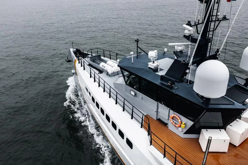 a large ship with a large white ship on it aboard POWER PLAY Yacht for Sale