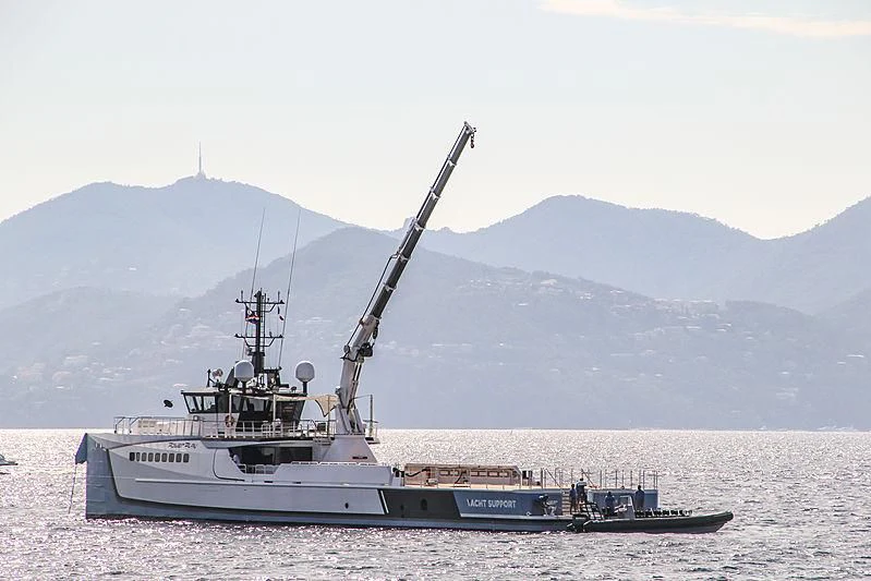 a boat in the water aboard POWER PLAY Yacht for Sale