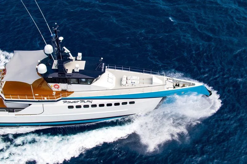 a boat on the water aboard POWER PLAY Yacht for Sale