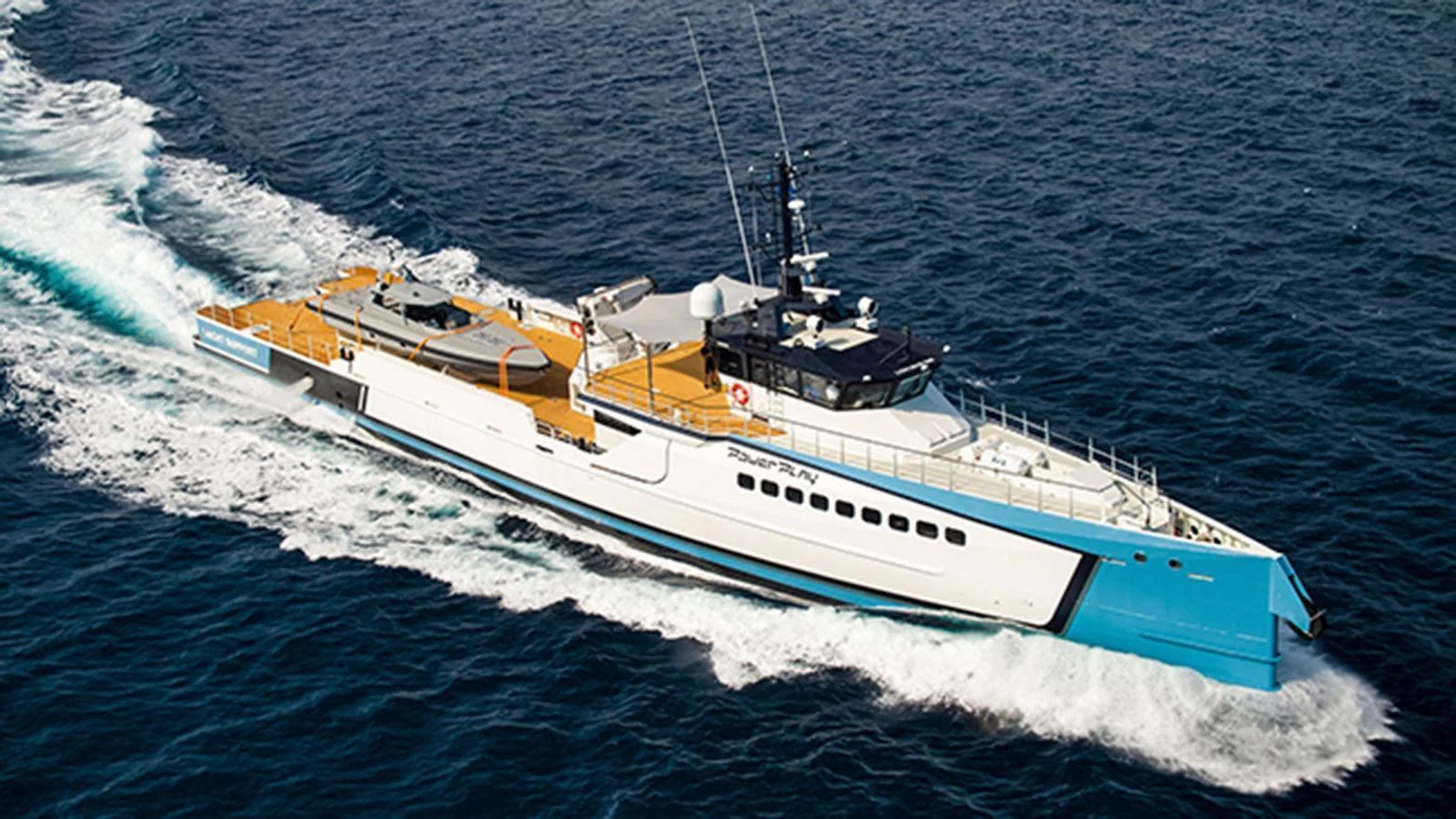 a boat on the water aboard POWER PLAY Yacht for Sale