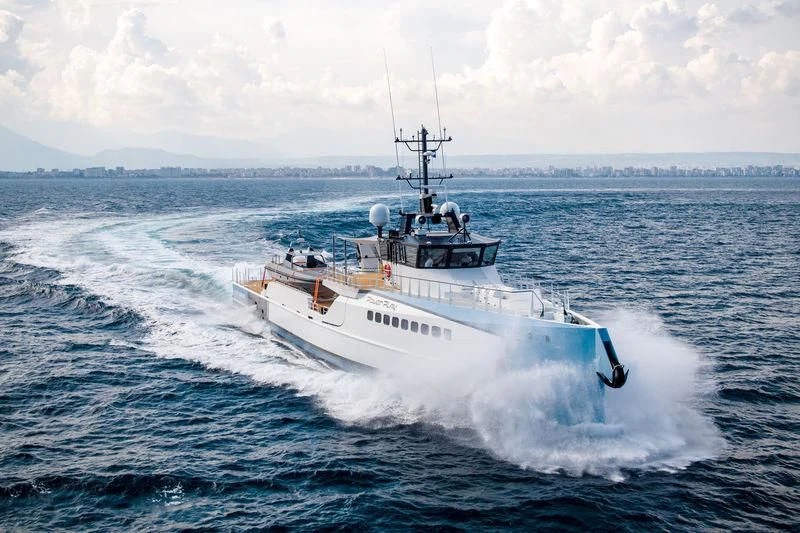 a boat on the water aboard POWER PLAY Yacht for Sale