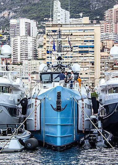 a boat is parked in the water aboard POWER PLAY Yacht for Sale