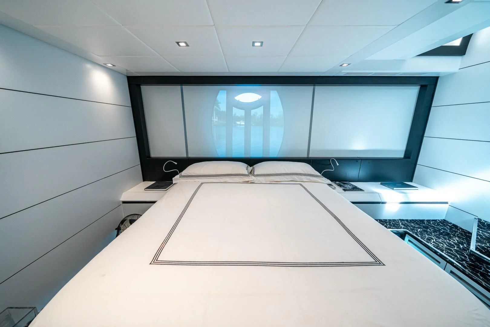 a room with a large screen aboard HAWK Yacht for Charter