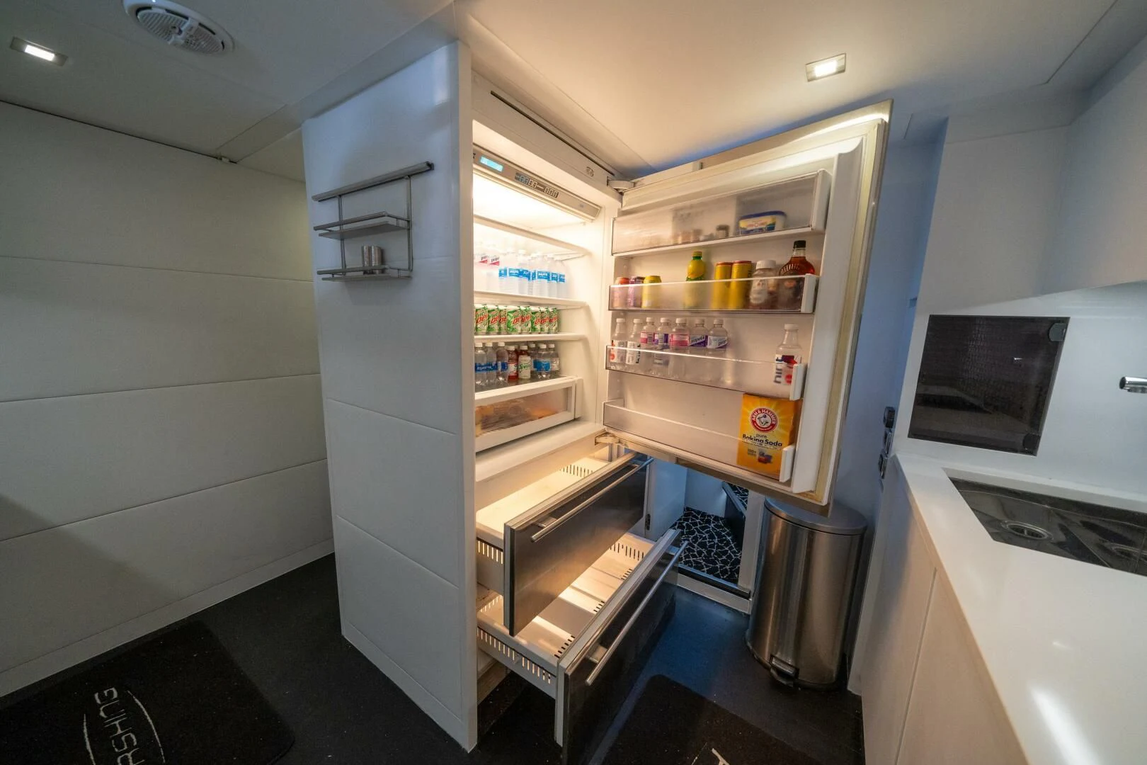 a refrigerator is open aboard HAWK Yacht for Charter
