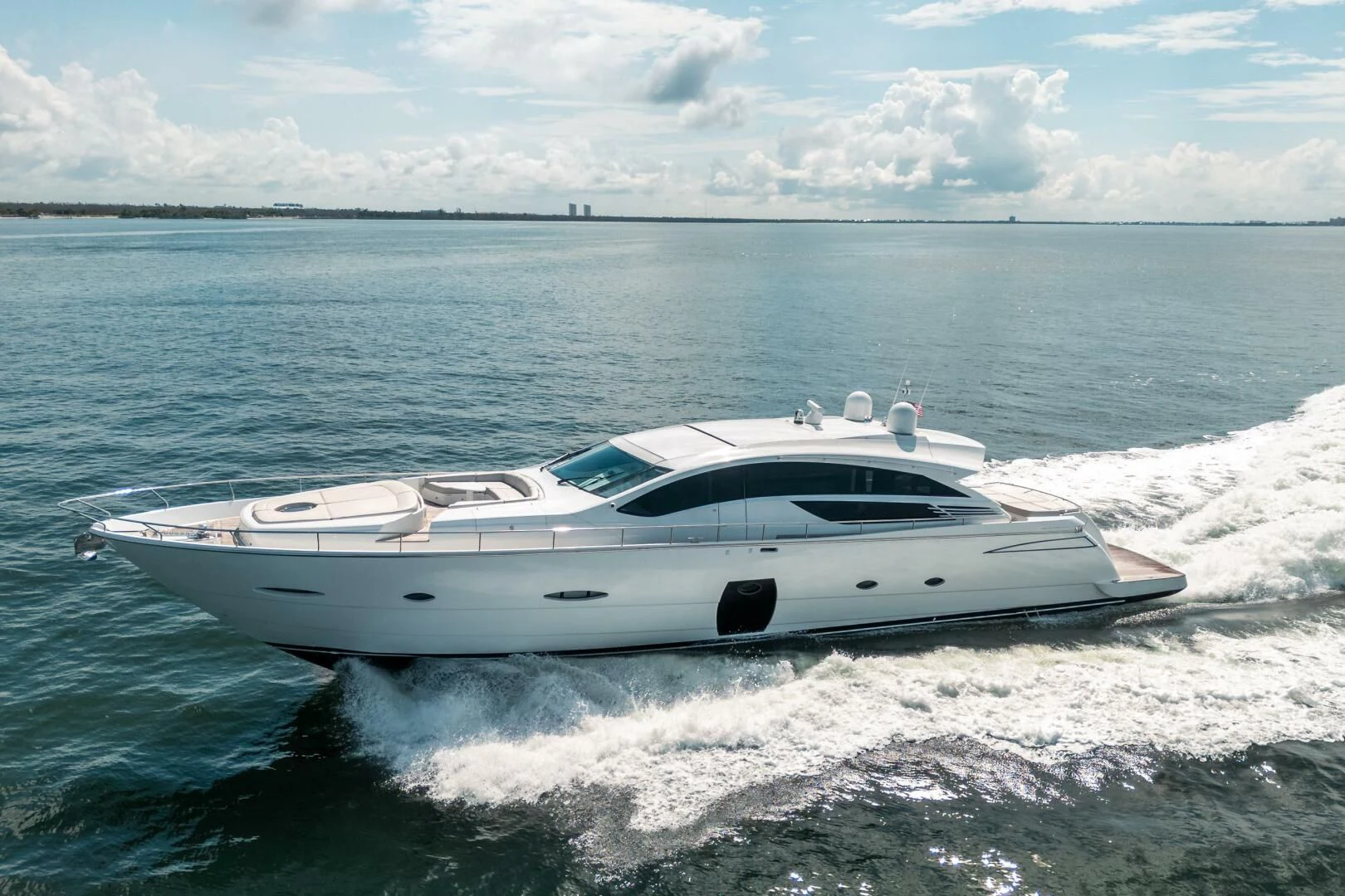 a white yacht on the water aboard HAWK Yacht for Charter