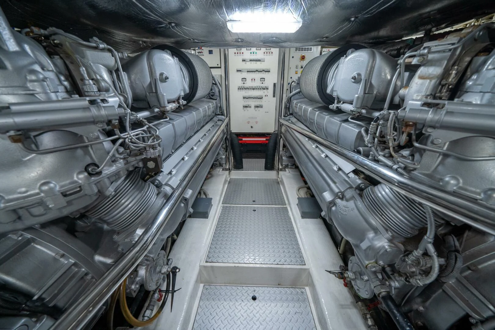 a large machine with large pipes aboard HAWK Yacht for Charter