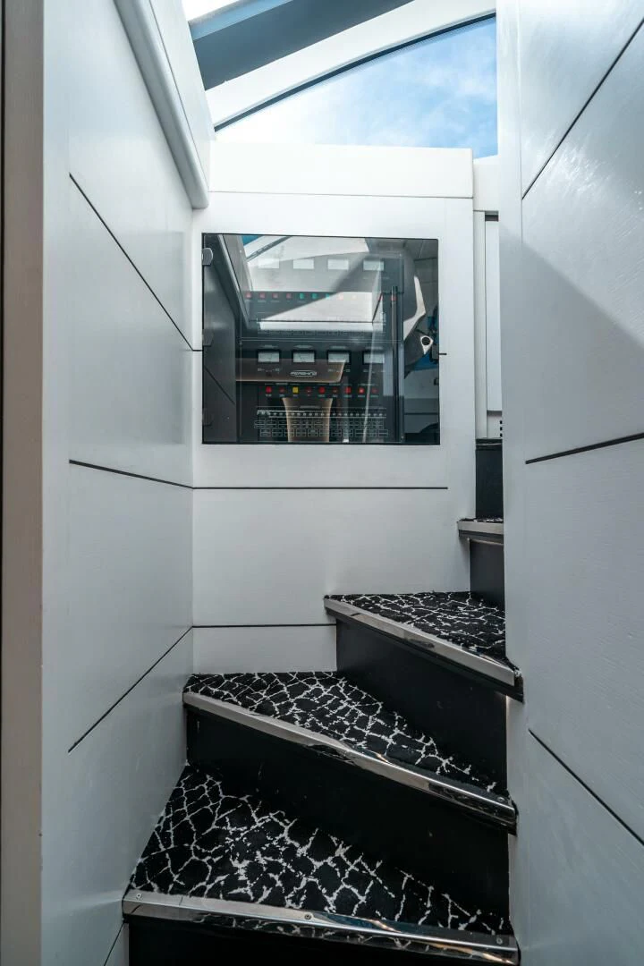 a machine with a glass door aboard HAWK Yacht for Charter