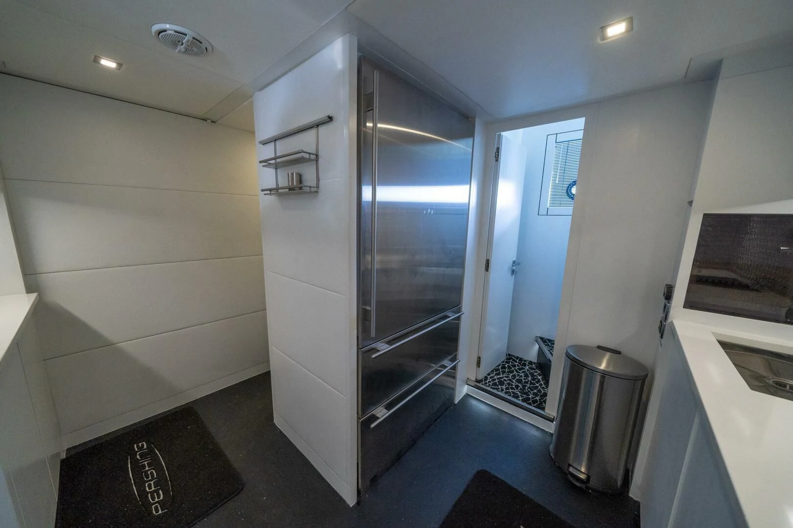 a large metal closet in a room aboard HAWK Yacht for Charter