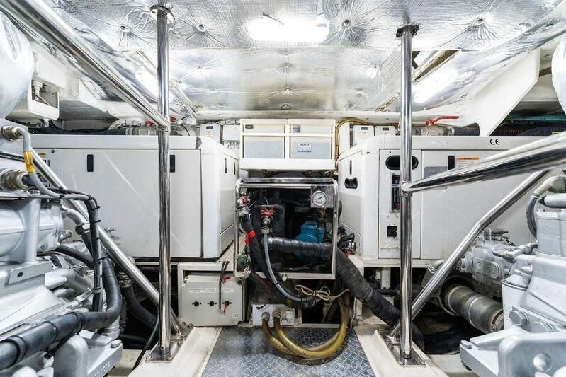 a person working on a car aboard HAWK Yacht for Charter