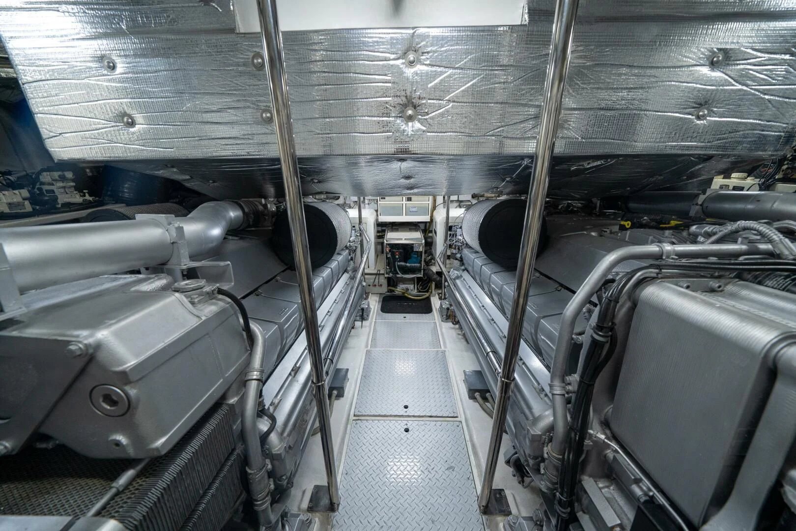 a large room with pipes aboard HAWK Yacht for Charter