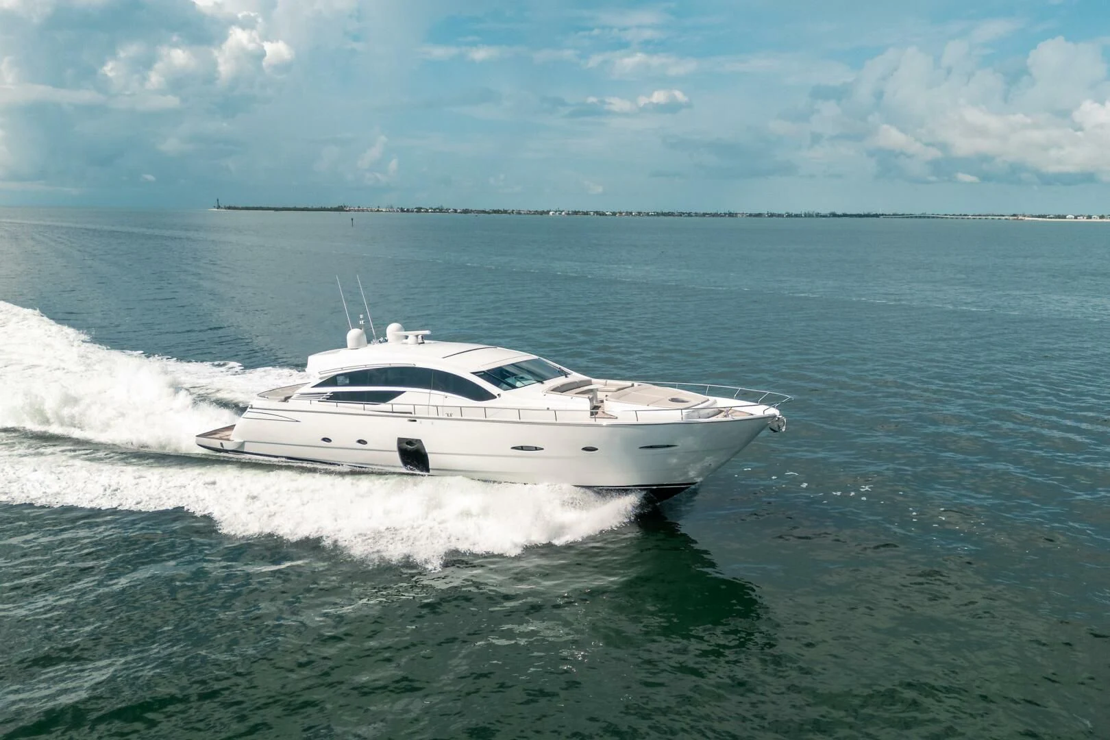 a white yacht on the water aboard HAWK Yacht for Charter