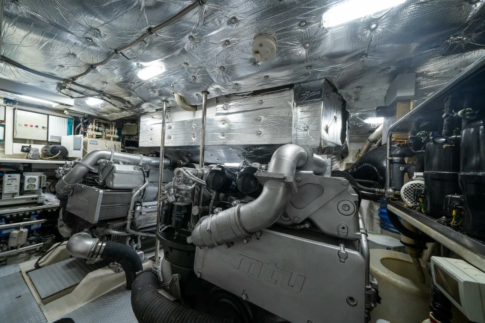 a large factory with machinery aboard HAWK Yacht for Charter