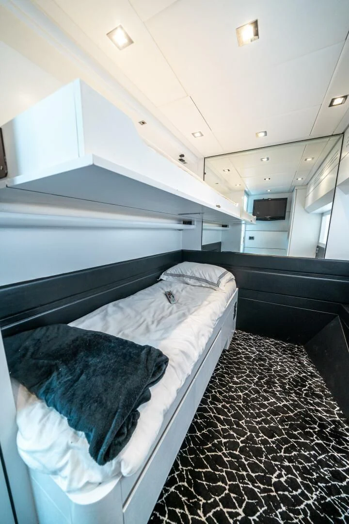 a bed in a room aboard HAWK Yacht for Charter