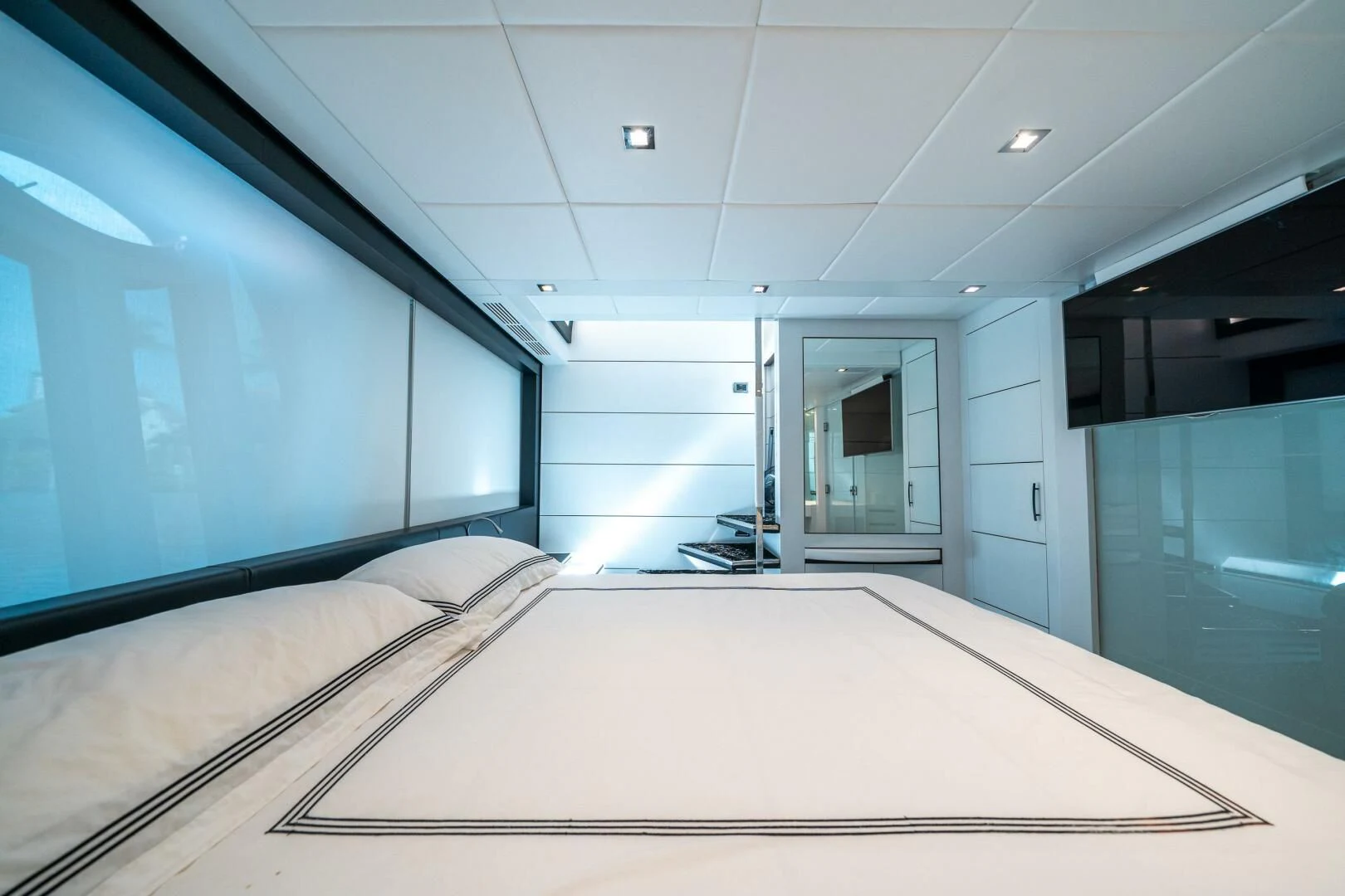 a room with a large window aboard HAWK Yacht for Charter