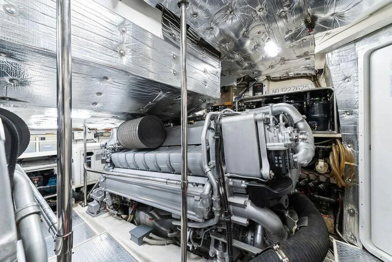 a large machine in a room aboard HAWK Yacht for Charter