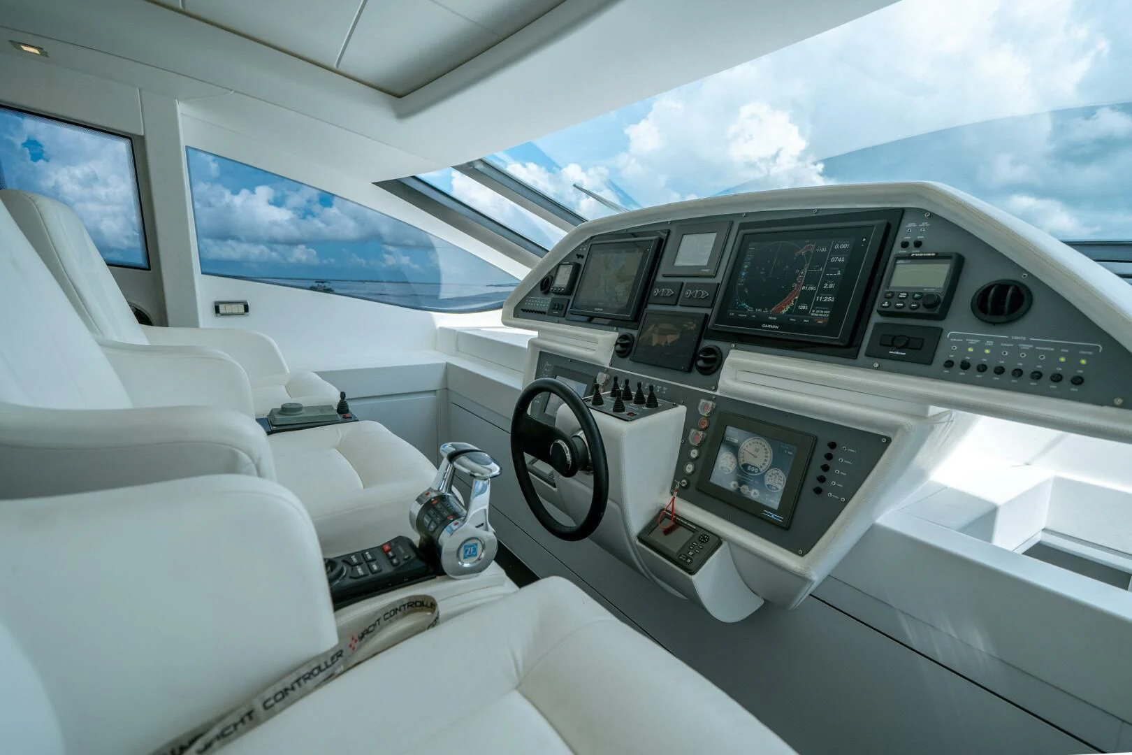 a car with a screen and buttons aboard HAWK Yacht for Charter