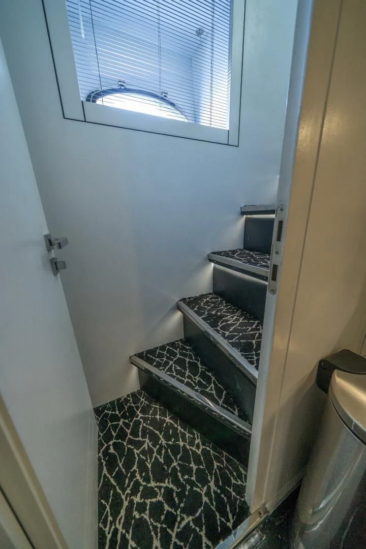 a small kitchen with a vent aboard HAWK Yacht for Charter