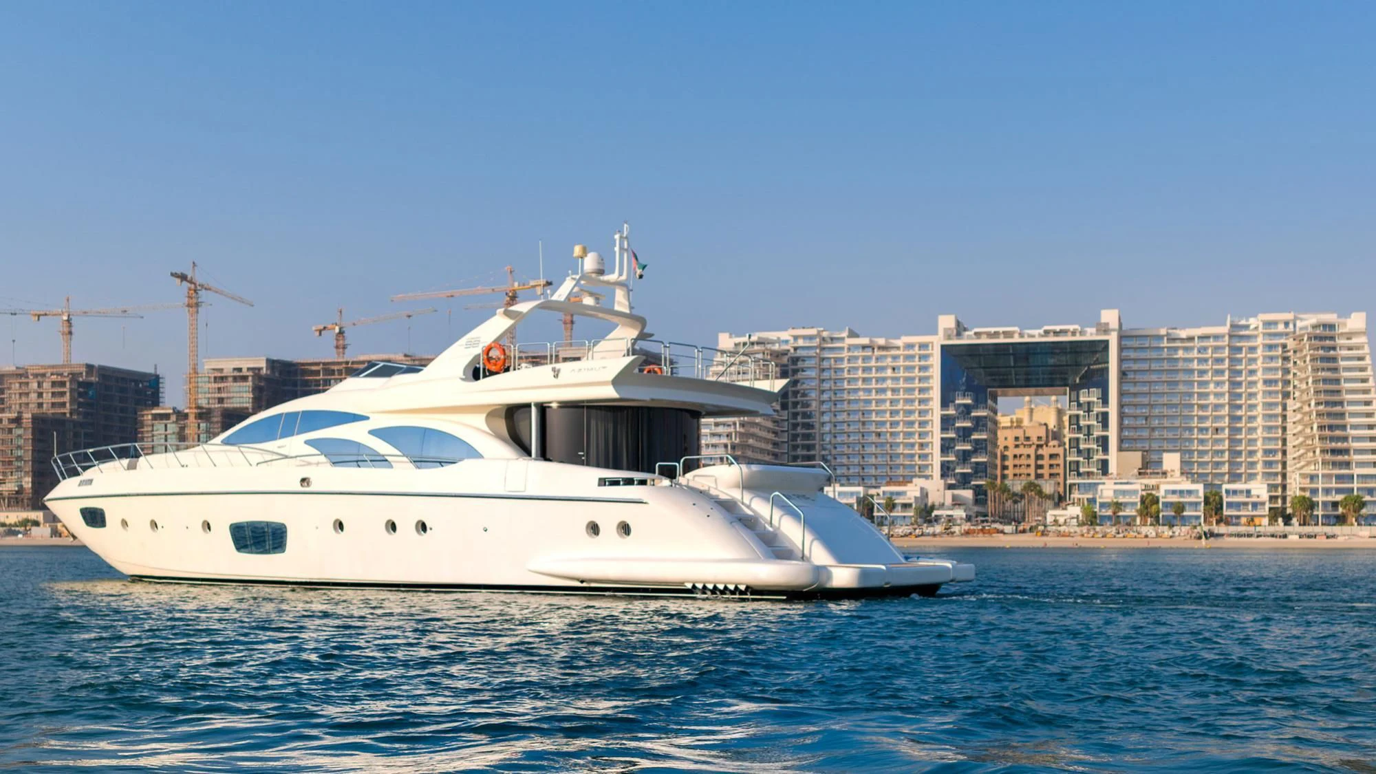 a white boat in the water aboard SHELLS Yacht for Sale