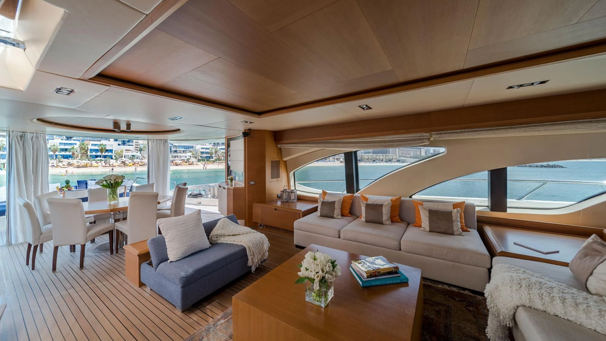 a living room with a large window aboard SHELLS Yacht for Sale