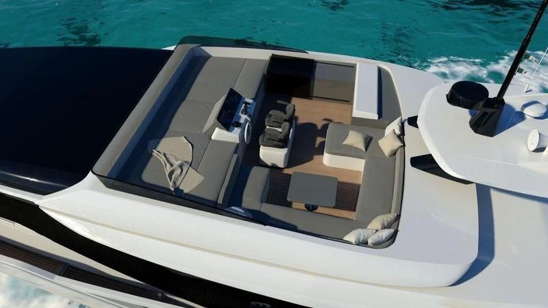 a white car on a beach aboard D&B Yacht for Sale