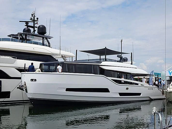 a couple of boats are parked in the water aboard D&B Yacht for Sale