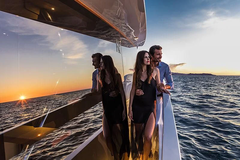 a group of people on a boat aboard D&B Yacht for Sale