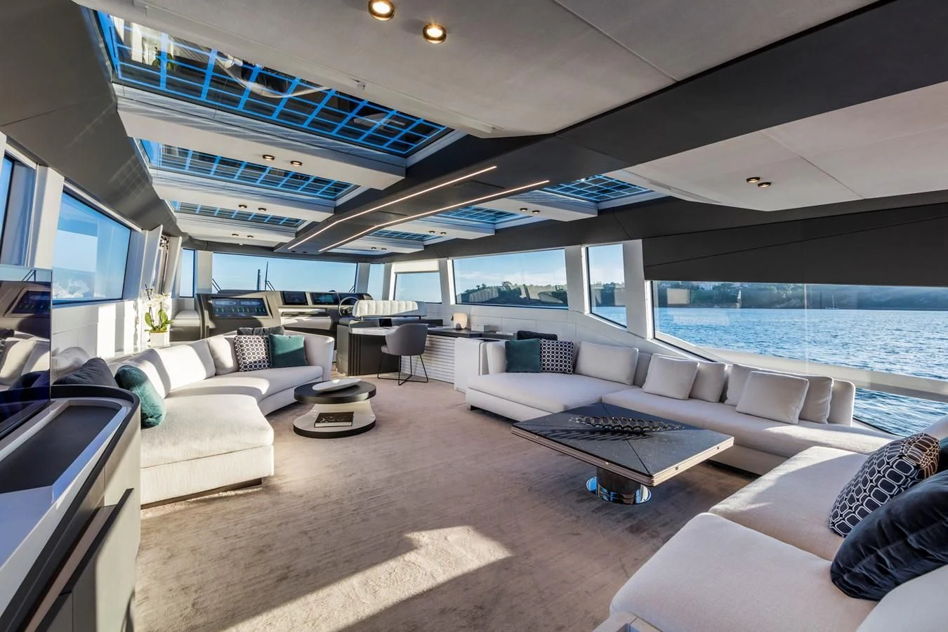 a large living room with a large pool aboard D&B Yacht for Sale
