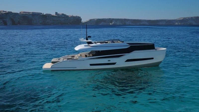 a white boat in the water aboard D&B Yacht for Sale
