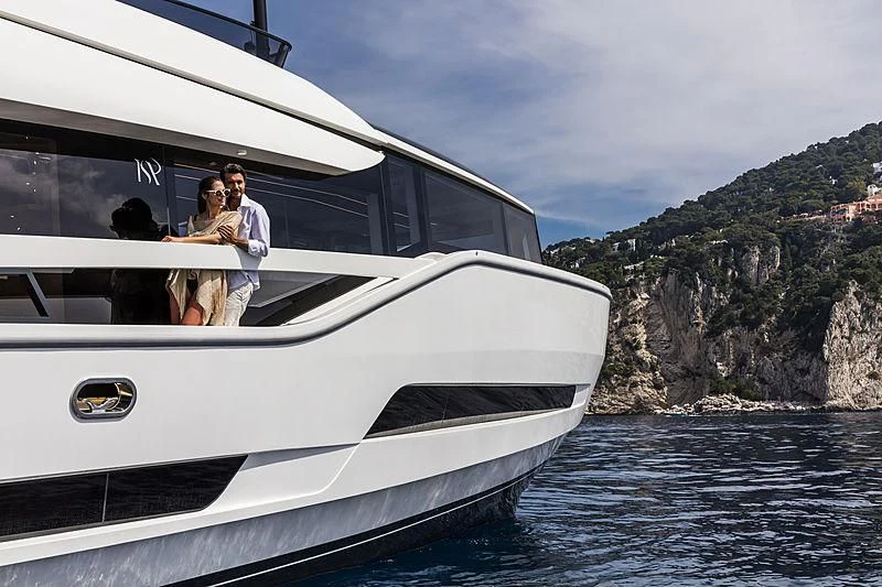 a couple on a boat aboard D&B Yacht for Sale