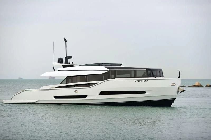 a white yacht on the water aboard D&B Yacht for Sale